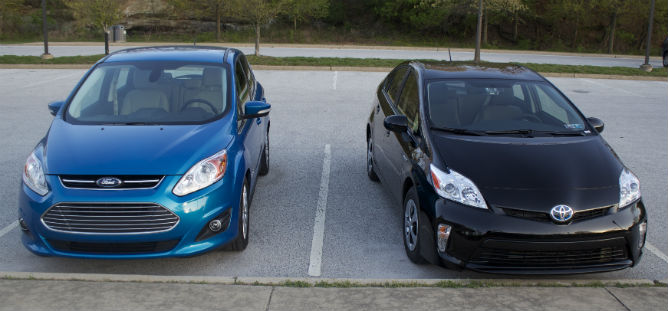 Next to a Prius Liftback.